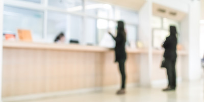People out of focus at financial institution