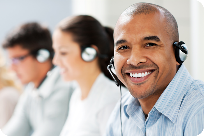 Call center staff with headphones